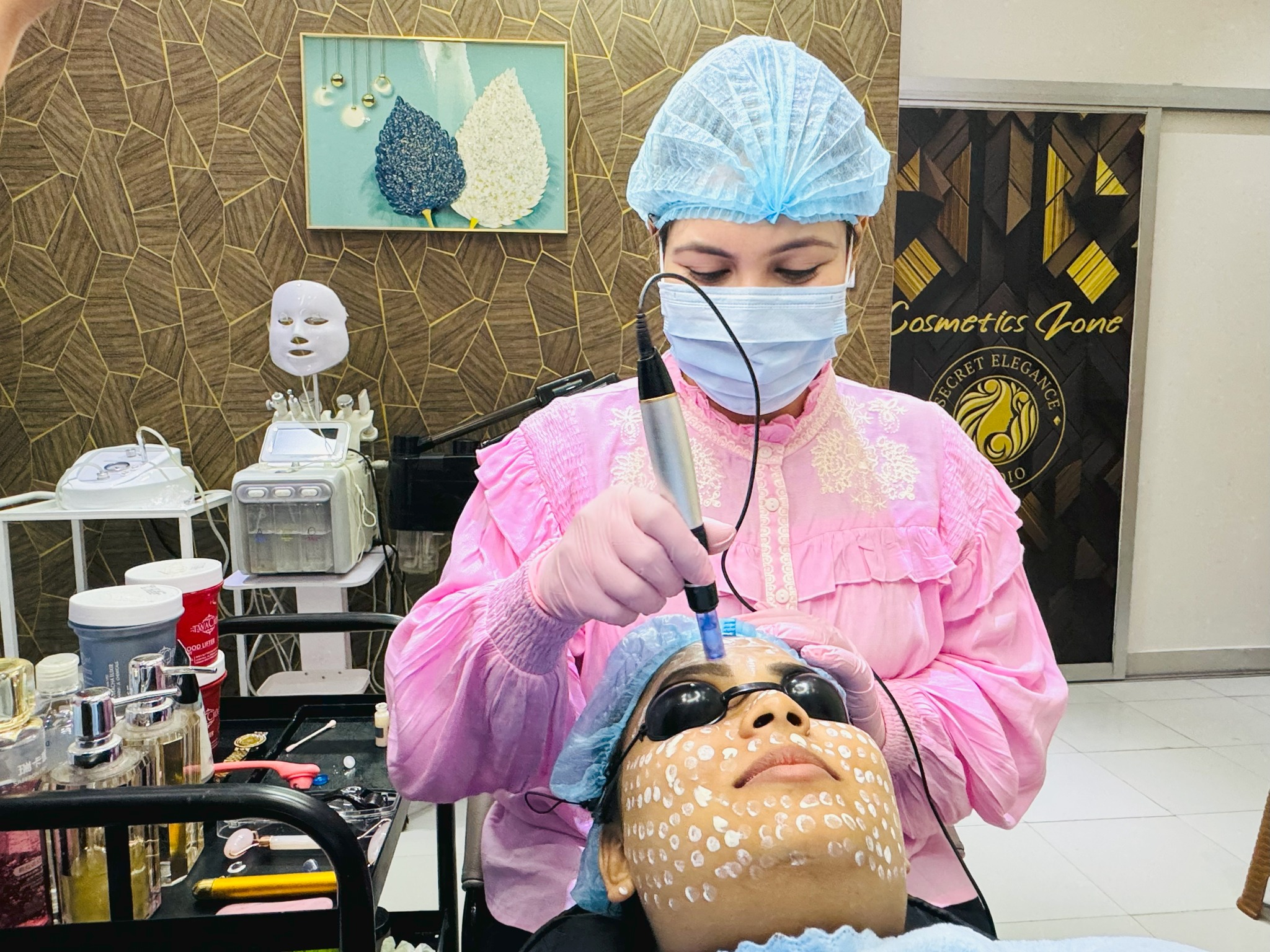 Farzana performing a professional advanced skin-care treatment